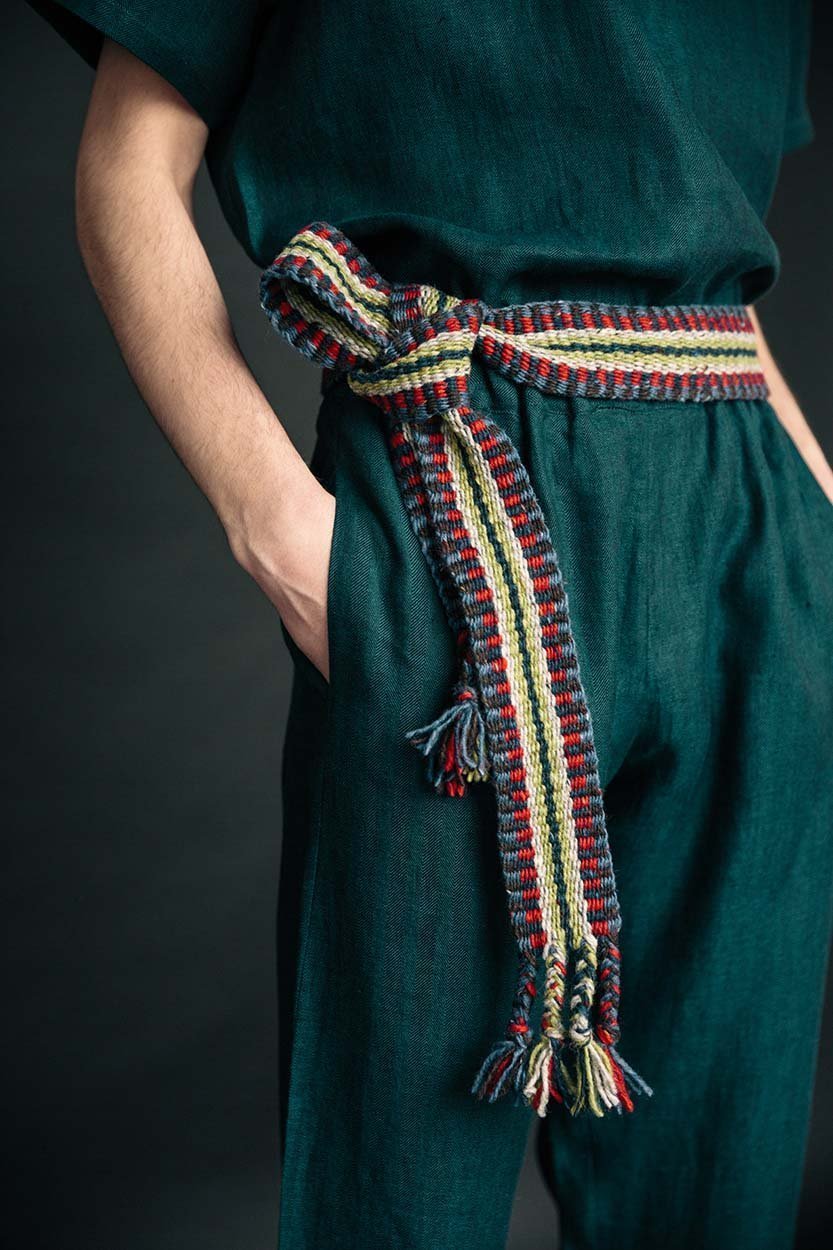 Handwoven Irish Crios belt featuring vibrant wool stripes, crafted by traditional Aran Island artisans.