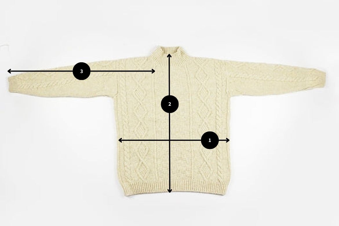 Cream merino wool Aran jumper with traditional cable and diamond stitches, handcrafted by Irish artisans.