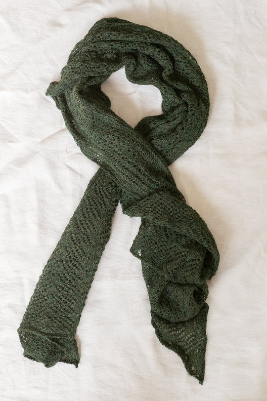 Peat green alpaca wool scarf featuring intricate Irish lace patterns, hand-knitted by Marian for a soft, durable finish.