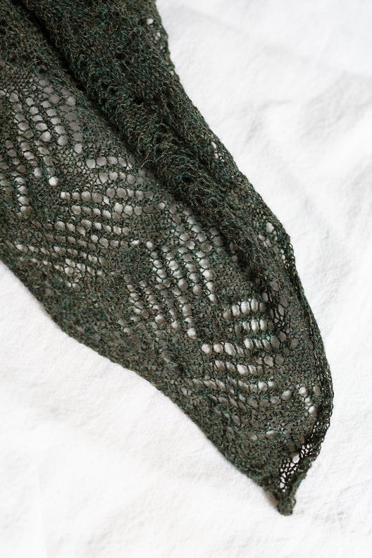 Peat green alpaca wool scarf featuring intricate Irish lace patterns, handcrafted by Marian for a soft, durable finish.